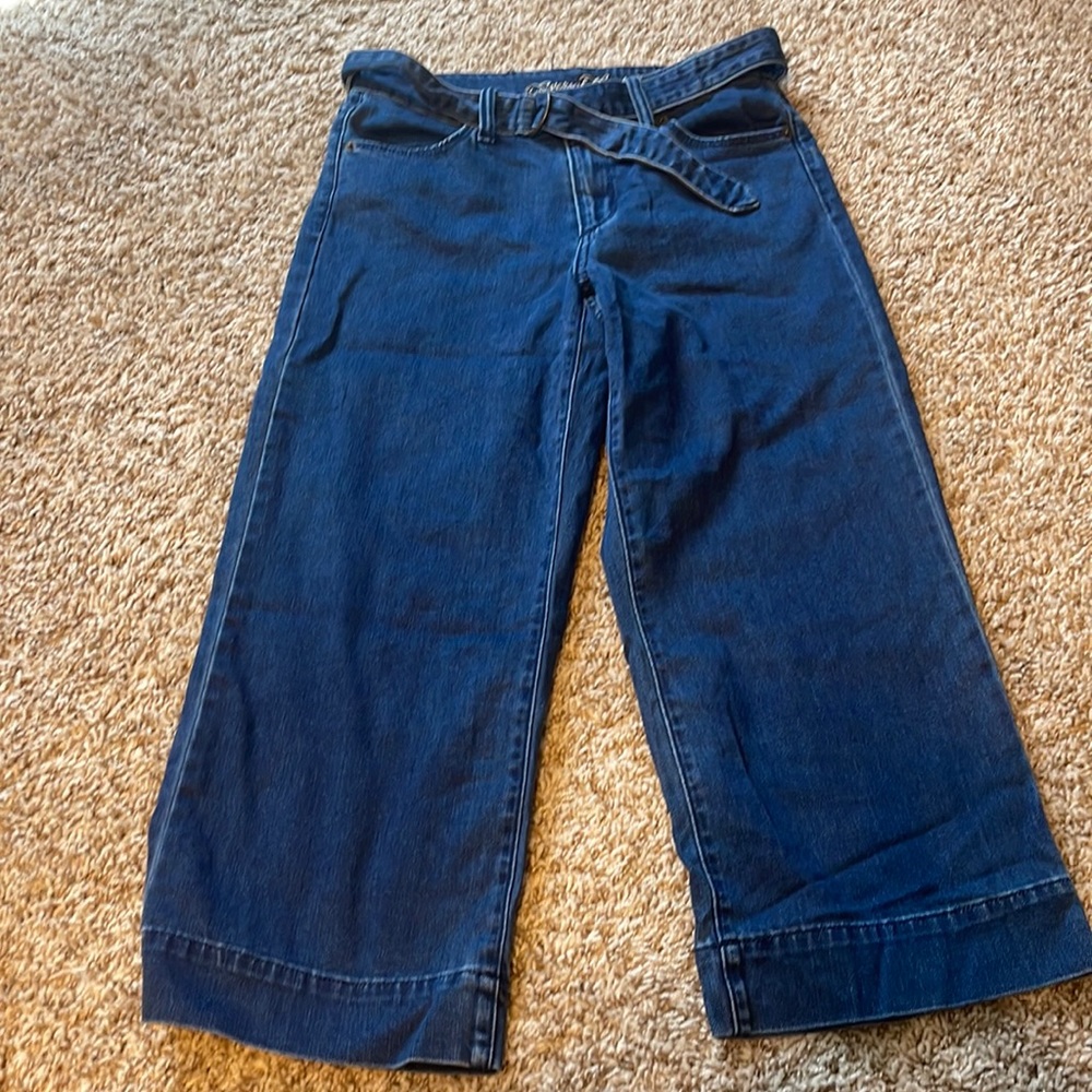 Universal thread high-rise crop jeans with flare at the bottom.